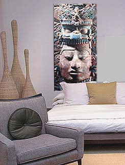 large wall art featuring mayan sculpture